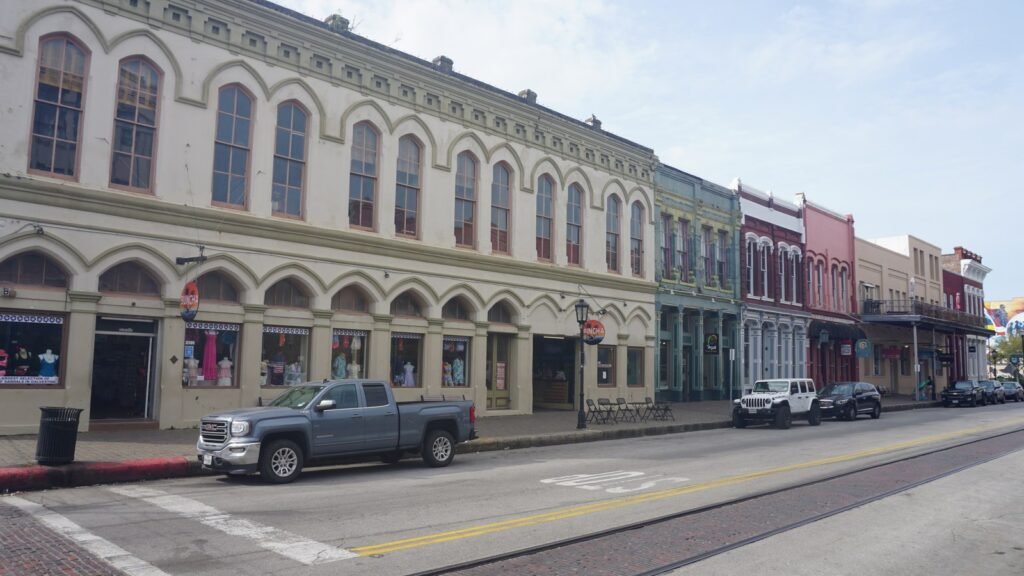Strand Historic District streetscape in downtown Galveston — licensed location context for the Greek Festival weekend near downtown parish grounds; not a photograph of Assumption parish at 714 19th Street or of the October 2026 festival