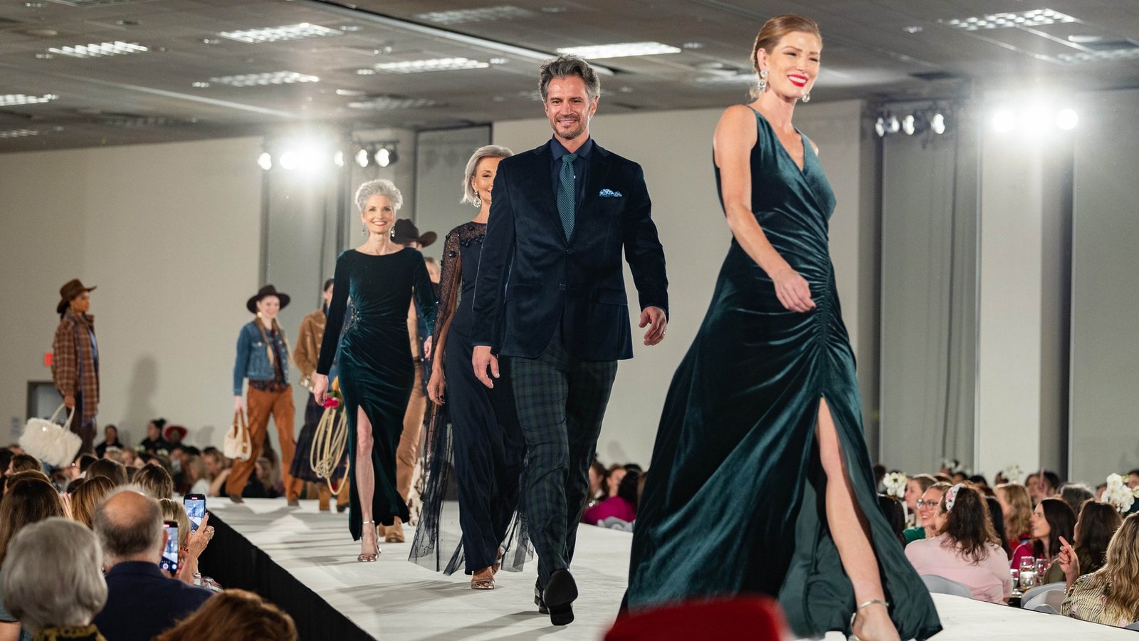 Models in velvet evening wear and western looks walk the runway at the 2025 Sugar Plum's Fashion Show and Luncheon at Nutcracker Market
